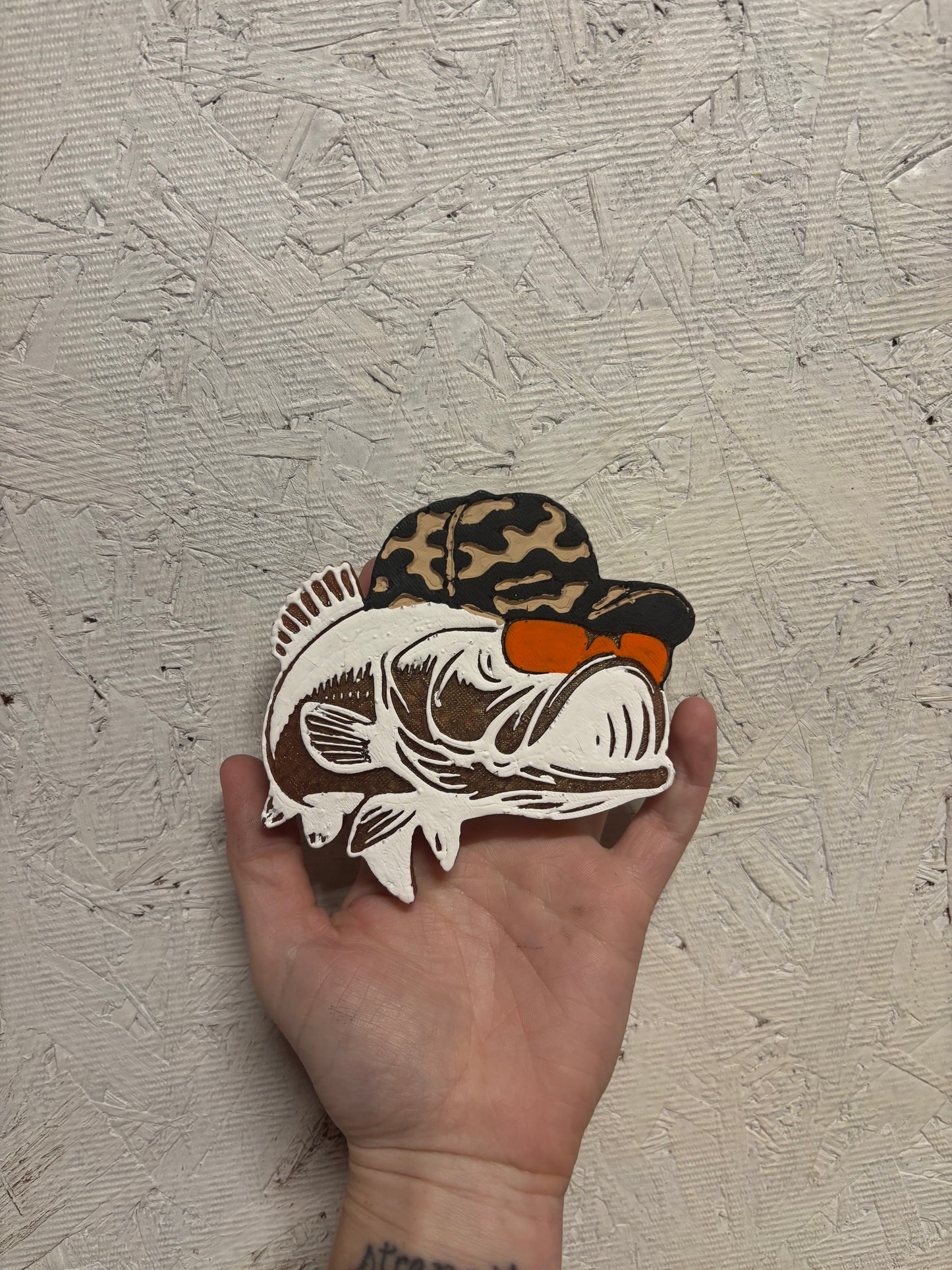 fish with camo hat