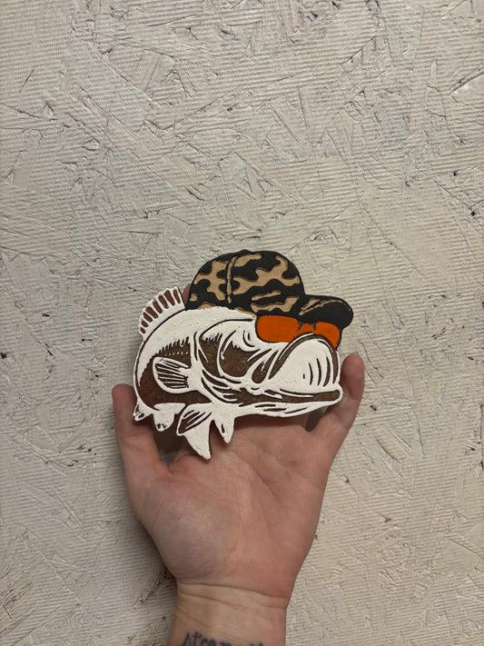 fish with camo hat